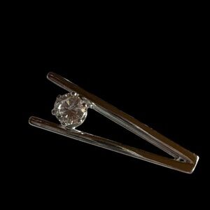 Silver and White Brooch with Intricate Design